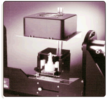 Malvern Panalytical Nasal Spray Actuator mounted on the Spraytec optical bench.