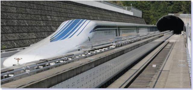 The L0 (L-zero) series magnetic-levitation train, developed by Central Japan Railway Company sits parked on a test track at the control center before a trial run in Tsuru, Yamanashi Prefecture.