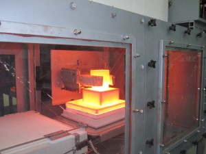 Inert atmosphere batch melt furnace featuring robotic operation