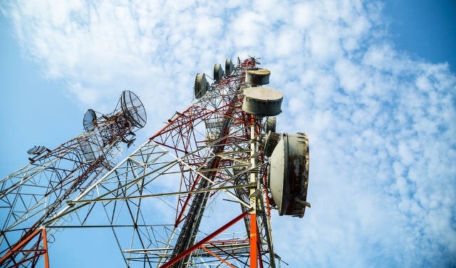 Fiberglass is transparent to radio waves, making it the preferred material for screening cellular towers.
