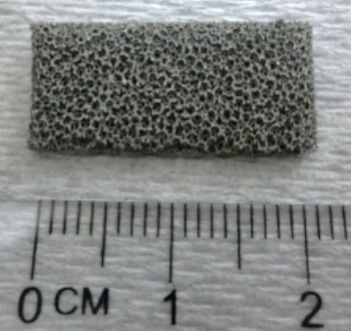 Photo (top) and SEM micrograph (bottom) of AlumiLok™ coated alloy foams.
