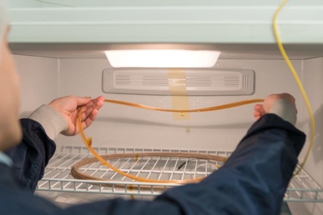 Testing scheme for sub-zero temperature measurements showing placement of fiber optic coils in the sub-zero freezer.
