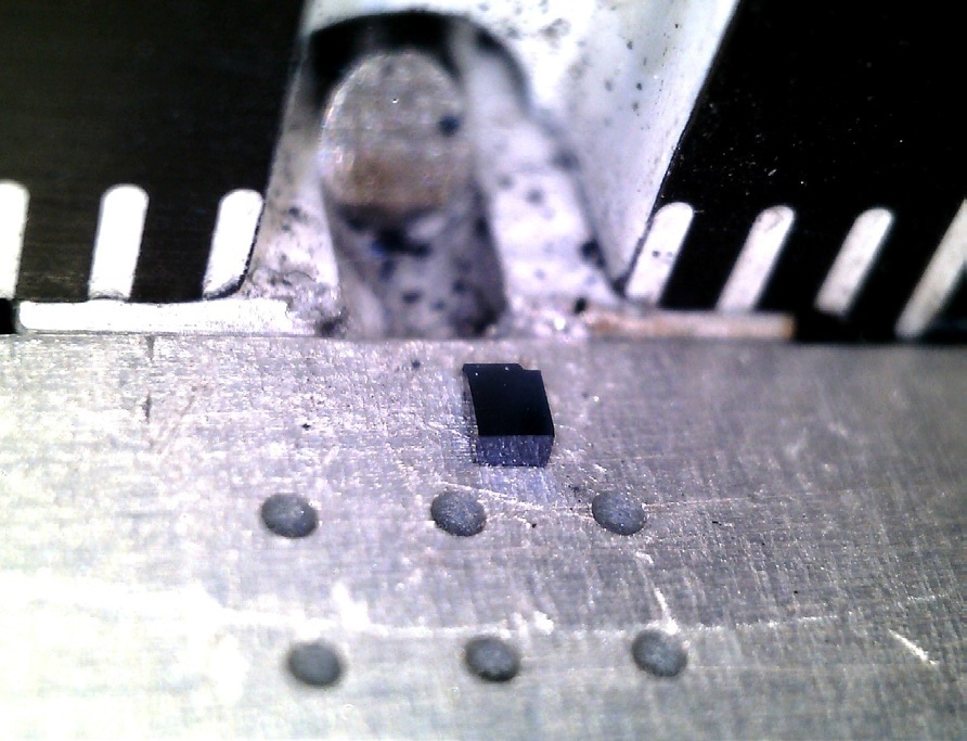 Crystal shown after cleaving with the LatticeAx. The SmB6 cleaved crystal is now ready for experiments to measure electronic properties.