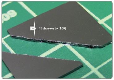 Sample cleaved at 45 degrees to (100) silicon using a long scribe.