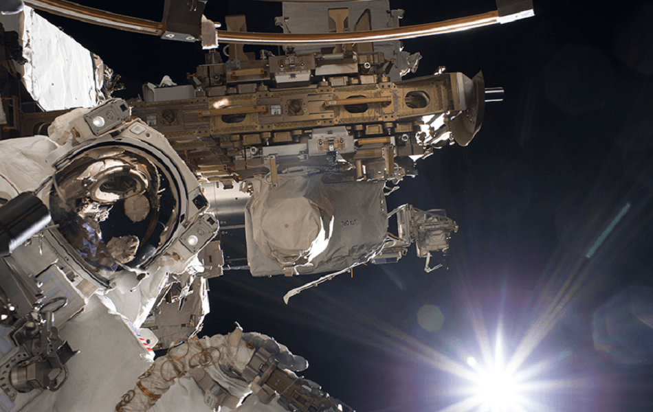 An astronaut on a spacewalk around the International Space Station. Credits: NASA/JSC.