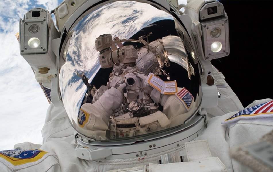 Astronaut Mark Vande Hei taking a selfie during a spacewalk on Oct. 10, 2017. Credits: NASA.