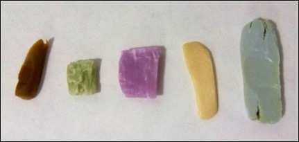 Pieces of soap studied by Raman spectroscopy. (From left to right) Aleppo soap, olive oil soap, grape seed oil soap, Marseille
