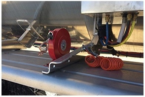 Static grounding reel mounted to fuel tanker