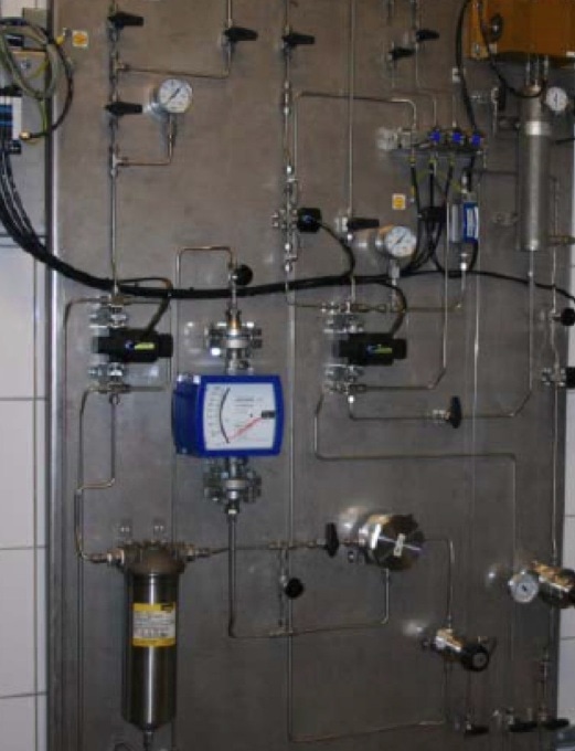 Sample conditioning and sample flow-cell panel with fastloop filter, heat exchanger, and coalesce.