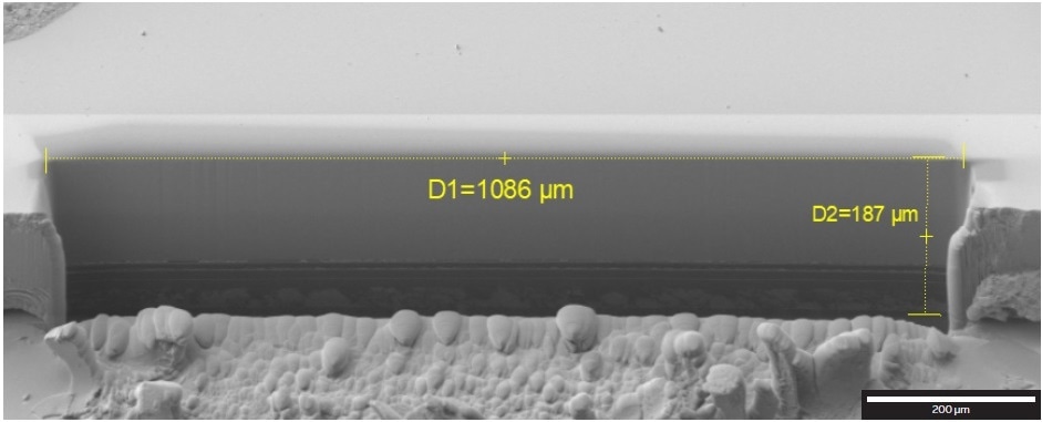 1086-µm-wide cross-section through part of an OLED display, SE detector at 2?kV.