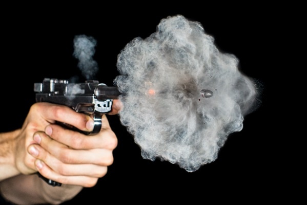 GSR particles are carried in the cloud of smoke after a gun discharge and deposited on shooters hand and surroundings