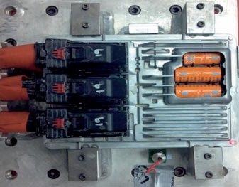 Measuring a capacitor‘s cradle while mounted in a product housing.