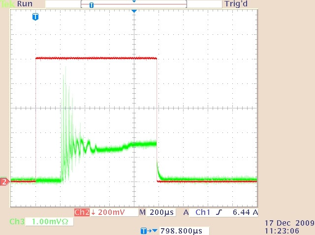 The quasi-cw laser output (lower trace) and drive current waveform (upper trace) for 0.5-ms duration. 10 A drive current pulse.