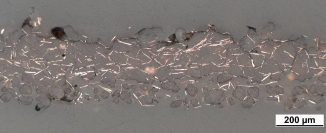 Single layer of PA12 and 5 vol% copper flakes.