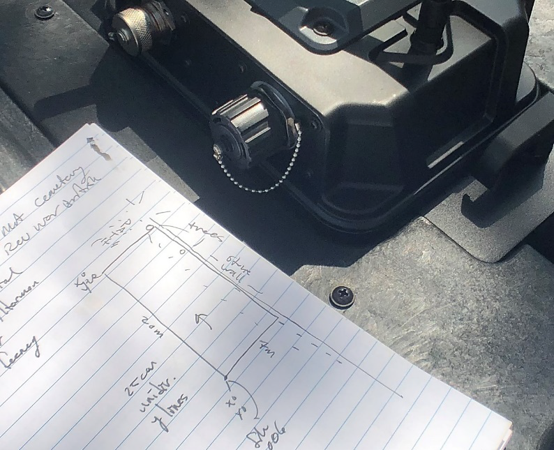 Use a notebook to mark possible targets, obstructions, and possible graves.