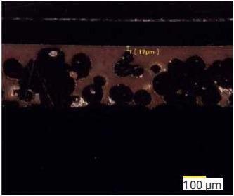 Cross-sectional of historical bearing construction showing limited polymer overlay thickness, in this case 17 µm.
