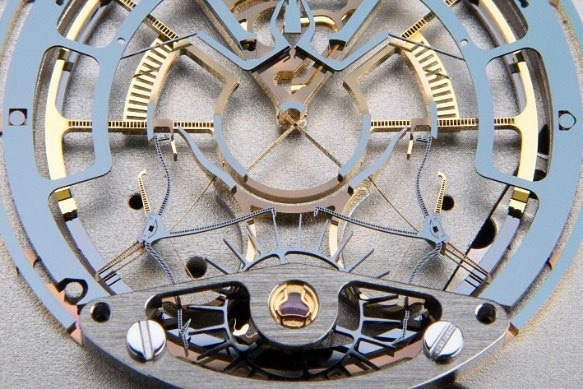 The "Double Hammer" escapement integrated in a watch.