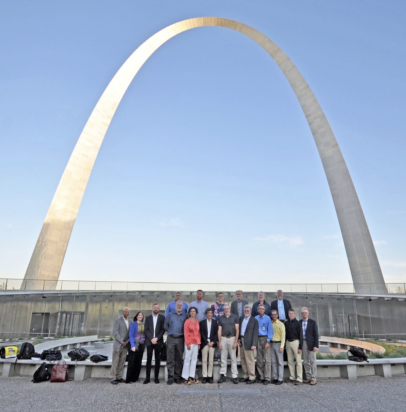Attendees at the 2018 Gateway Arch Expert Workshop pose in front of the Arch.