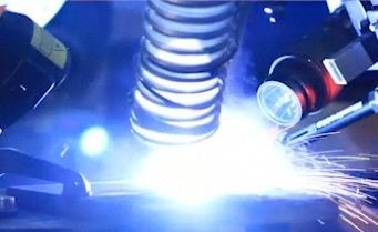 Typical setup in welding and additive manufacturing research shows* high-speed camera on the right with laser illumination on the left.