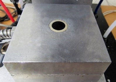 Carbon+Unitrode-1” coated dielectric sensor in press platen.