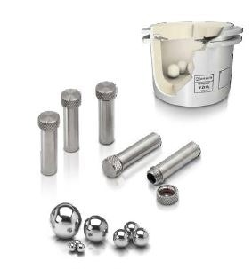 Examples of different jar and ball sizes used in laboratory ball mills: (a) small metal cups of 2 ml capacity used in Retsch mixer mills and (b) EasyFit jar with a capacity of 500 ml used in a Retsch planetary ball mills and (c) grinding balls of different size.