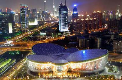 The Shanghai Oriental Arts Center glows beautifully at night.