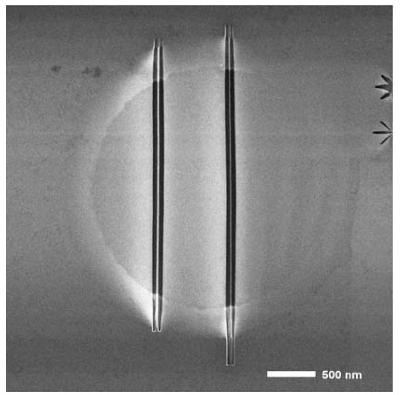 Suspended nano-ribbons created by helium ion milling. Left: 20 nm wide. Right: 10 nm wide.