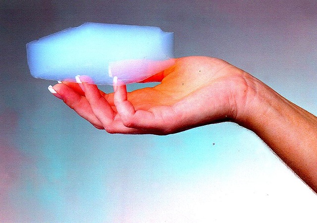 Though this looks like a hologram, this is a photograph of a lump of aerogel, which to the touch feels like Styrofoam.