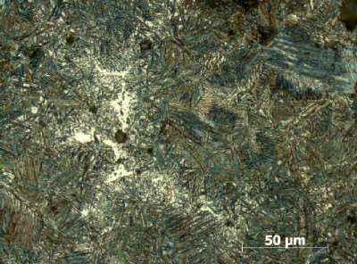 Light microscope image of ADI sample with a magnification of approximately 400:1. One can see the regions of interest with the precipitates.