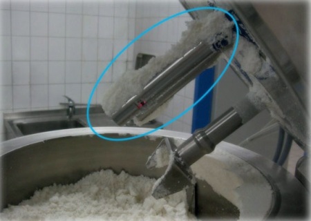 Image of an in-line particle size probe installed in a pilot scale high shear granulator.