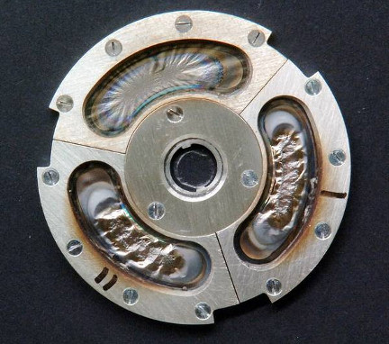 Target wheel from the TASCA system used to create atoms of the superheavy element 115 at GSI in Germany. The areas where thefilms have been bombarded by calcium ions are clearly visible.