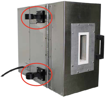 Stationary Column Mount. Mounting brackets attach the oven to the columns of a test machine