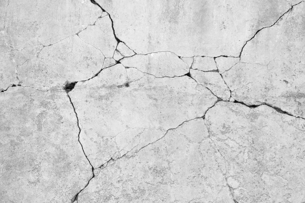 Crack Healing in Concrete Analyzed via Water Permeability Testing