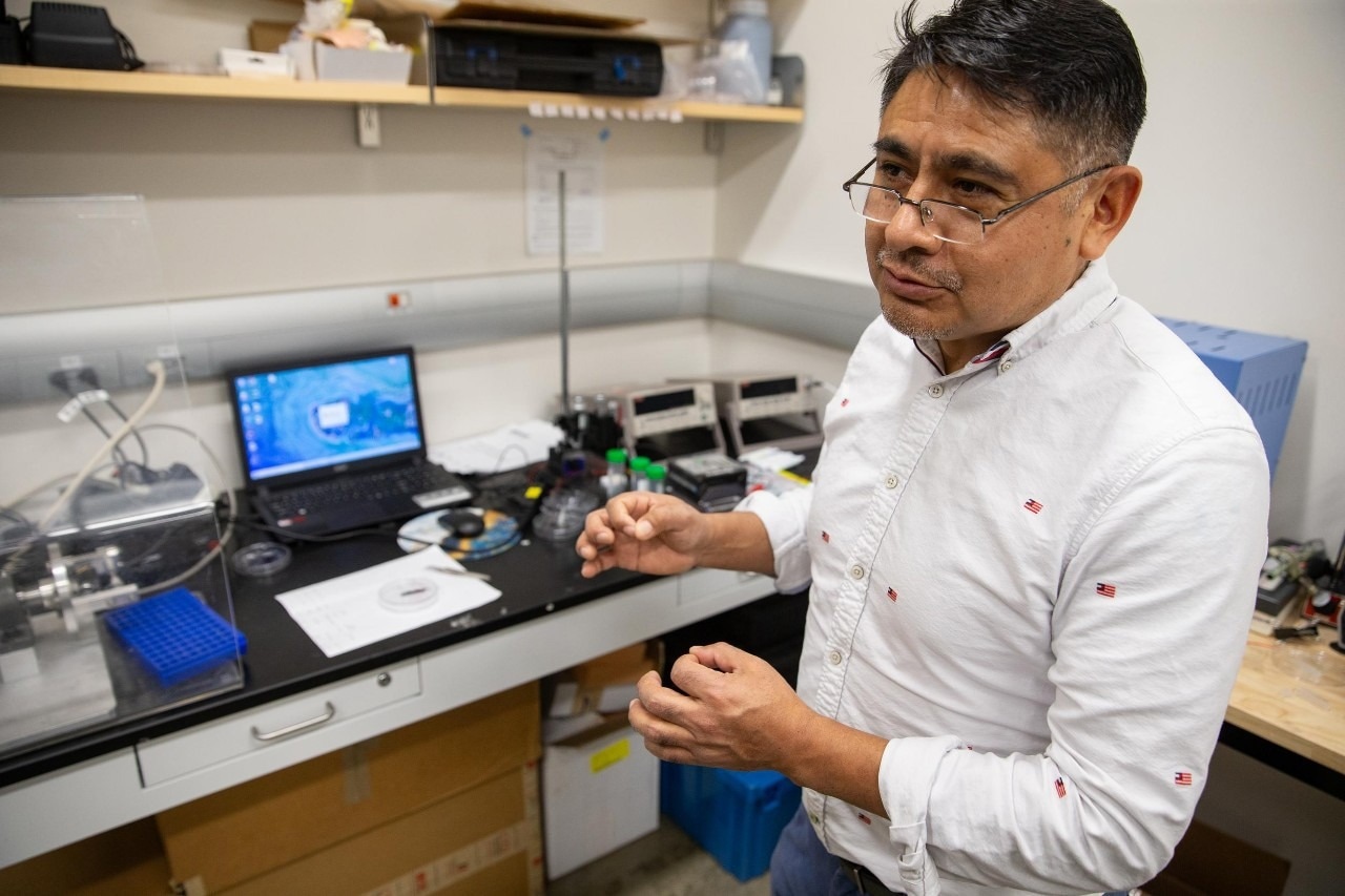 UC Associate Professor Noe Alvarez is studying the properties of carbon nanotubes in his chemistry lab.