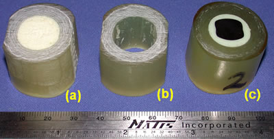 AZoJoMo – AZoM Journal of Materials Online - Stages of preparation of implant test samples: (a) original section of artificial femur, (b) reamed, and (c) final test sample.