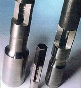 Rock drills formed by solid state joining showing the absence of welding flash.